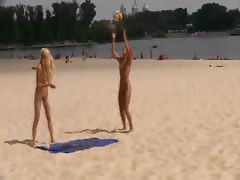 Hot teen nudists play at beach.