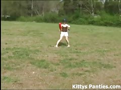 Innocent teen Kitty playing softball outdoors