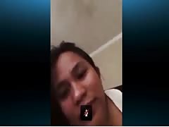 Asian Filipino Skype on bed